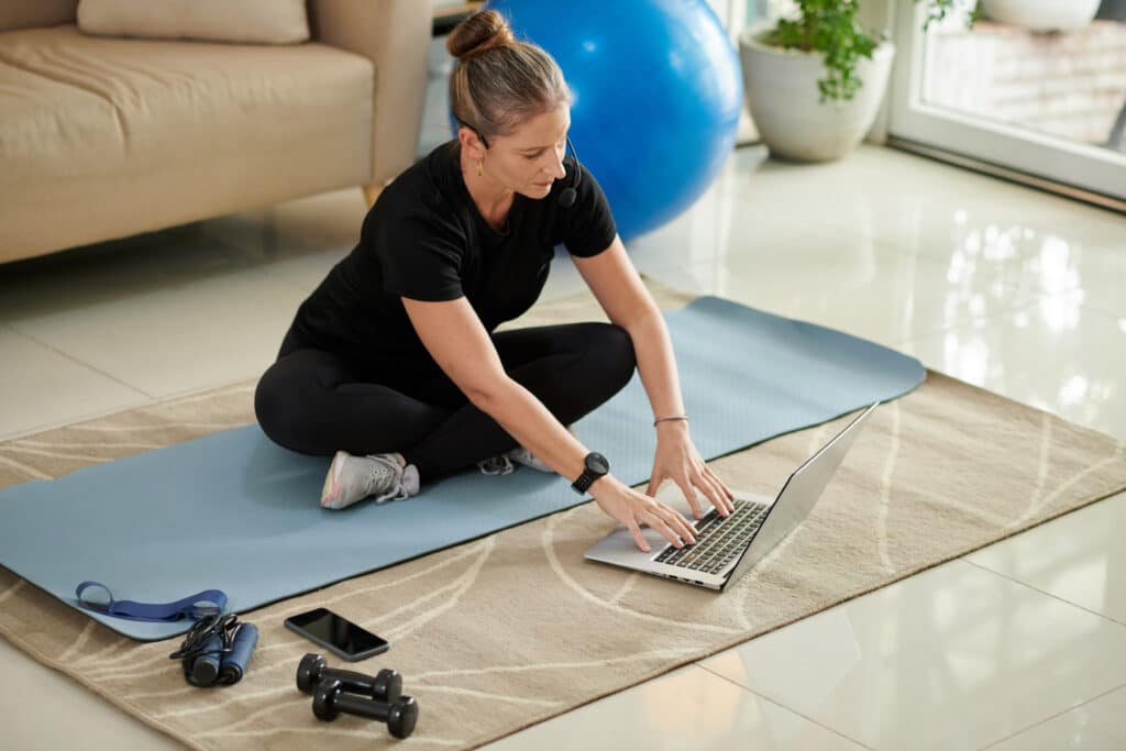 Online fitness trainer answering popular questions of clients.